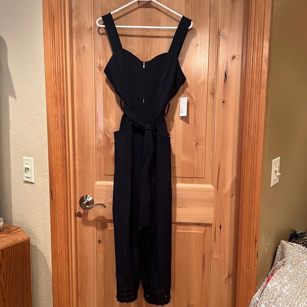 Woman’s jumpsuit by Julia Jordan.  Size 4.  Navy.